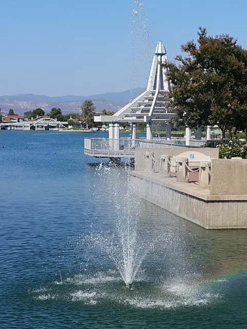 The fountain and lakeside pavilion at South Lake in Irvine's Woodbridge village